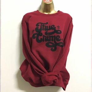 Unisex size XL True Crime red/maroon sweatshirt by artist Michelle Brusegaard
